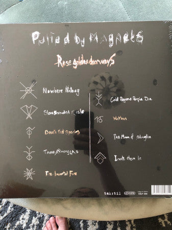 Pulled by Magnets : Rose Golden Doorways (LP, Album)