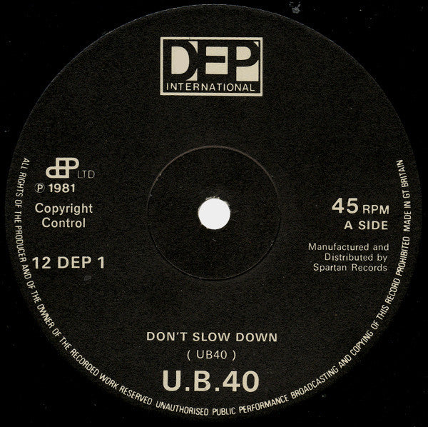 UB40 : Don't Slow Down / Don't Let It Pass You By (12", Single)