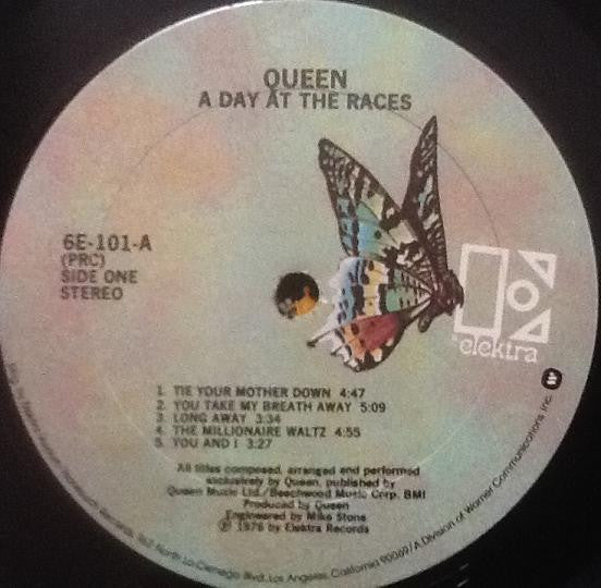 Queen ~ A Day At The Races (Vinyl) - Djungel & Jazz