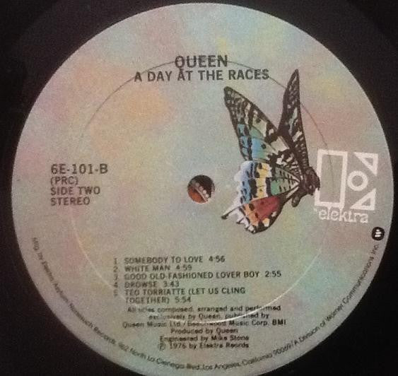 Queen ~ A Day At The Races (Vinyl) - Djungel & Jazz