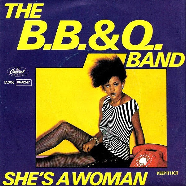 The B.B. & Q. Band* : She's A Woman (7")
